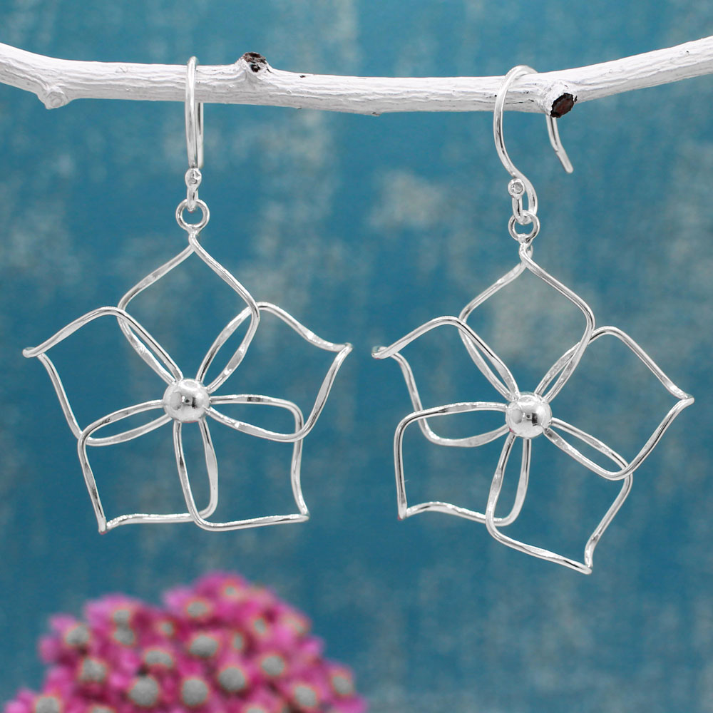 Moineir - Fiesta Plumeria Silver Earrings - Dangle  Diameter: 37 MM Length: 48 MM from the top of the French wire Features: Lightweight, highly polished silver Fastening: Sterling silver French wire Style: Perfect for summer