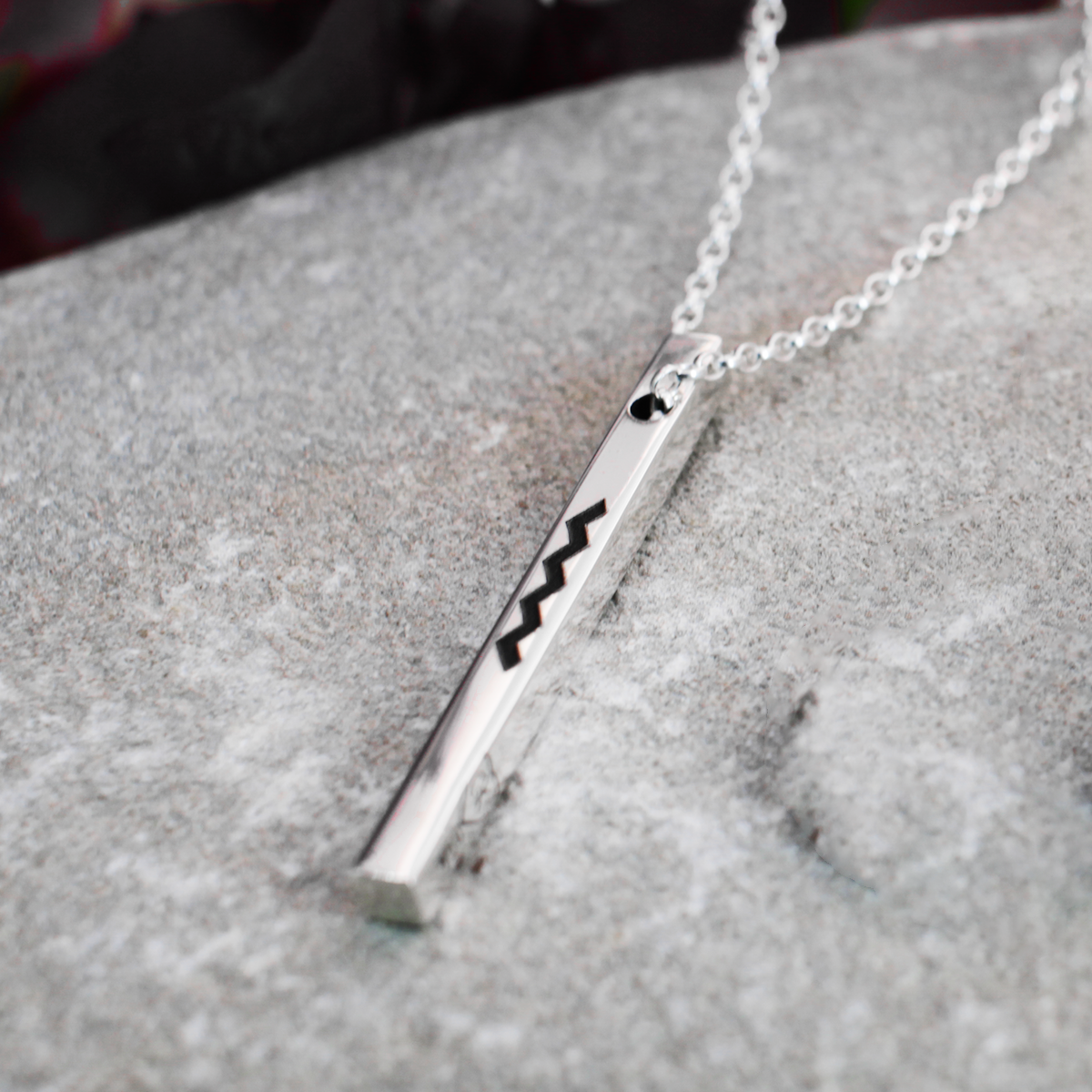EIRE - Ogham Grá & Wild Atlantic Way High Polished Bar Silver Pendant Curated and designed by Emilio Sotelo Jewelry for Croi Kinsale Jewellery in Kinsale West Cork Ireland Europe. Find exceptional handmade silver and gold jewellery at affordable prices for birthday gifts and Christmas presents. Find Irish designers and makers. Beautiful jewellery shop located in Kinsale, Co. Cork.