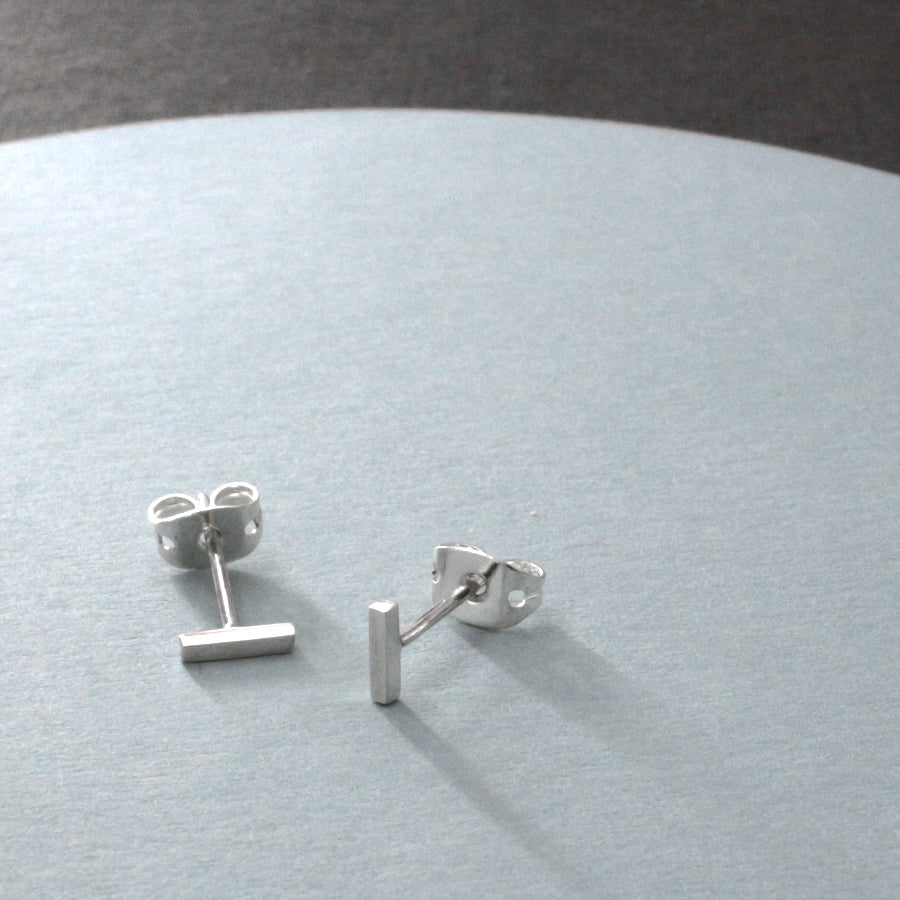 Piccoli Tiny T Silver Stud Earrings