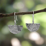 Transform your style with the&nbsp;Saha DECO Abanico Oxidised Silver Earrings. Inspired by Art Deco elegance, these handcrafted earrings feature a whimsical fan-shaped design with a weaved embossed pattern. The oxidised finish highlights the intricate details, creating a striking contrast with the polished silver. Flirty yet timeless, these earrings are perfect for everyday wear or a touch of glamour on special occasions. Ireland jewellery