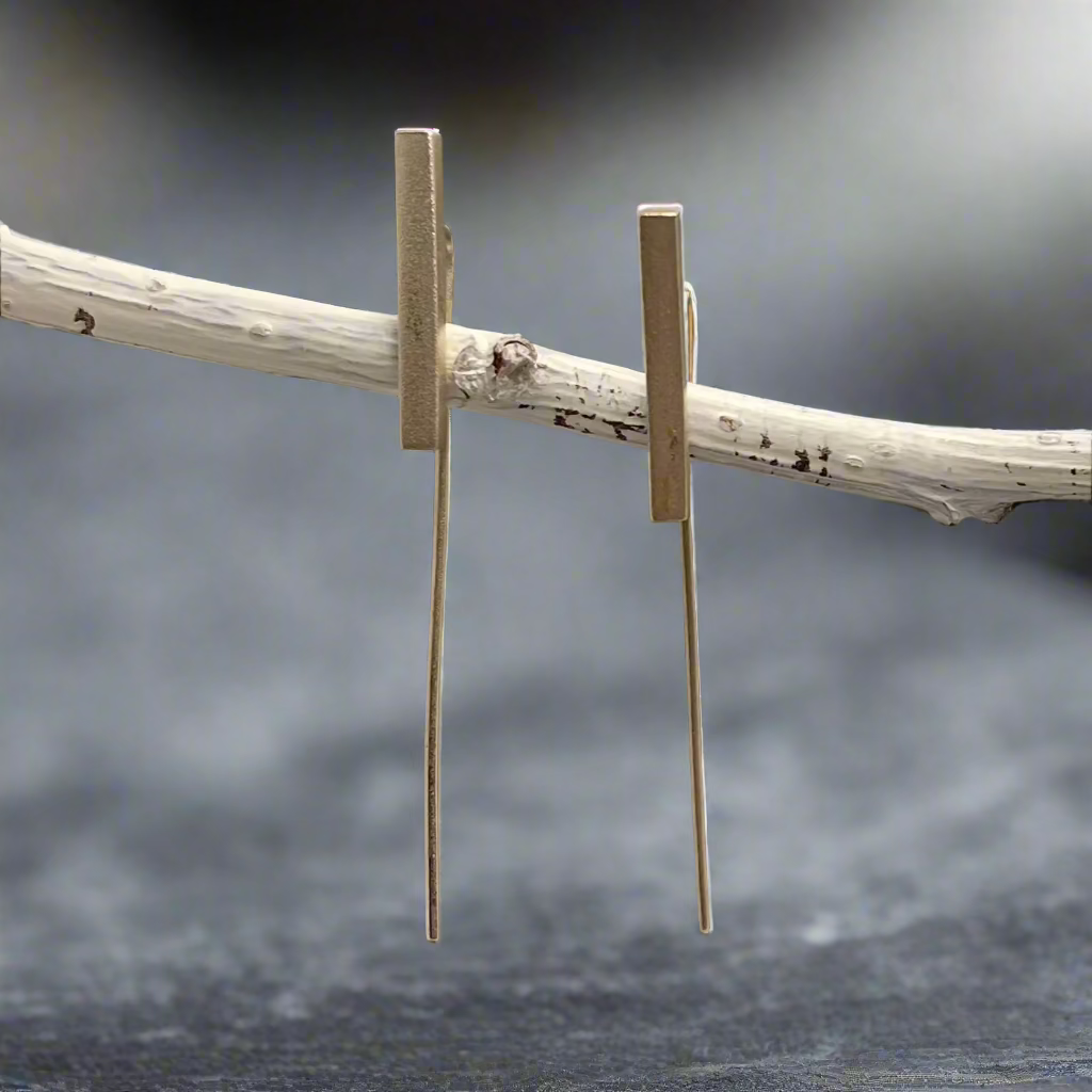 Add a sleek and minimalist touch to your jewellery collection with the&nbsp;Saha Bar Pin Silver Earrings. Expertly handcrafted from .925 sterling silver, these modern earrings feature a matte finish and a streamlined design, making them perfect for everyday wear or as a thoughtful gift for someone special. Ireland jewellery west cork