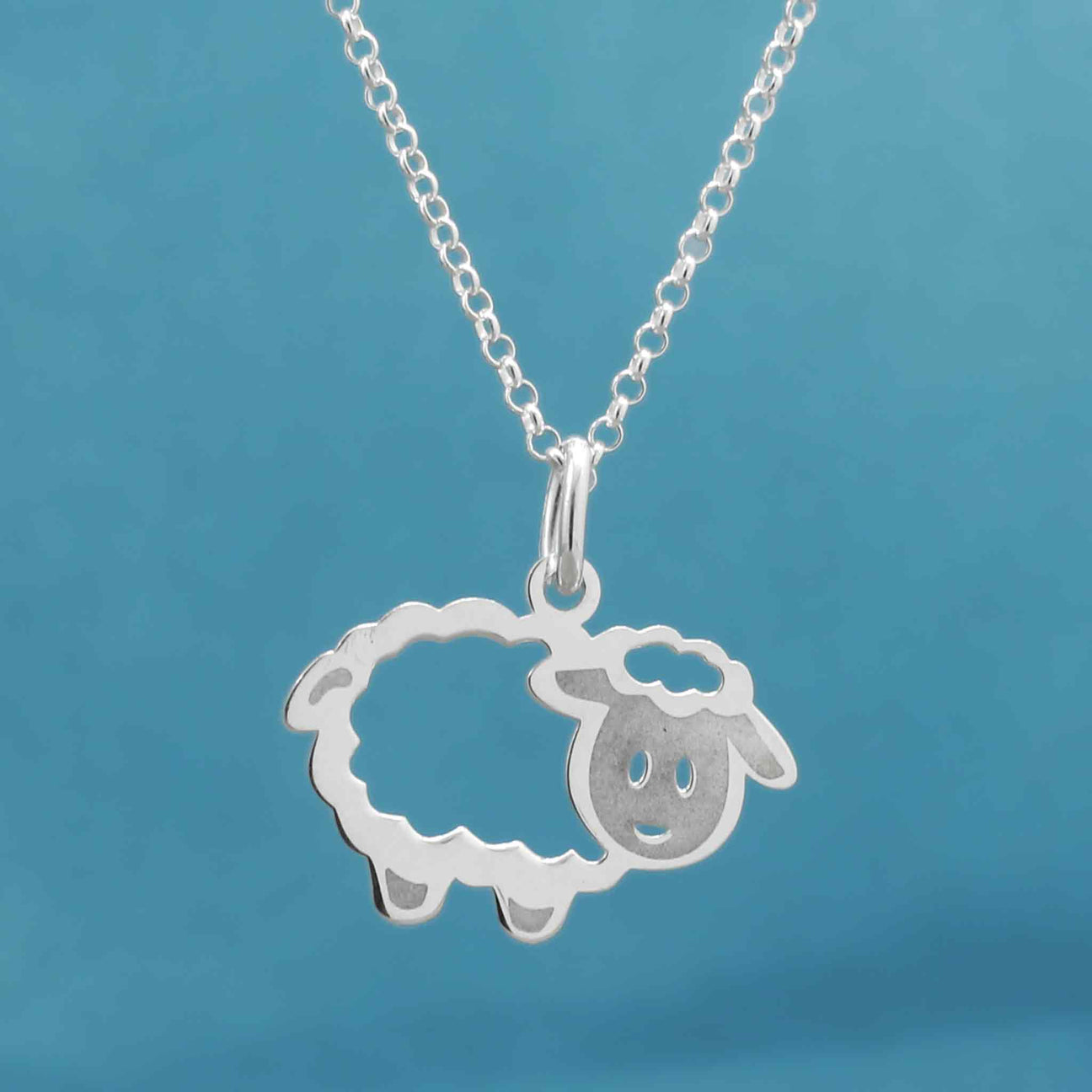 Éire Sheep White Enamel Silver Pendant,Ê Shop affordable, high-quality jewellery in Kinsale, West Cork, Ireland designed by Kathleen Holland Jewellery
