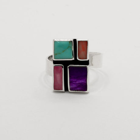 Sleveen's Rectangle With Multi-Coloured Mosaic Resin Adjustable Silver Ring is 13mm wide, 18mm long, 3mm deep, and 5mm wide on the silver band. Easily adjusted to fit sizes 7-10, this .925 silver piece is inspired by the vibrant hues of Kinsale's homes.