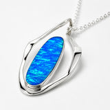 Tara Blue Opalescent Oblong in Flame-Shaped Framed Silver Pendant