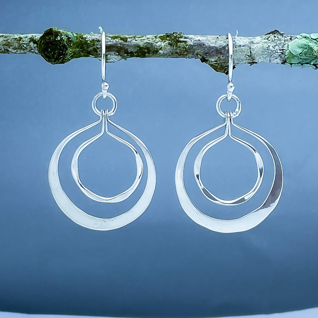 Tara Luminous Dangling Double Circle Silver Dangle Earrings