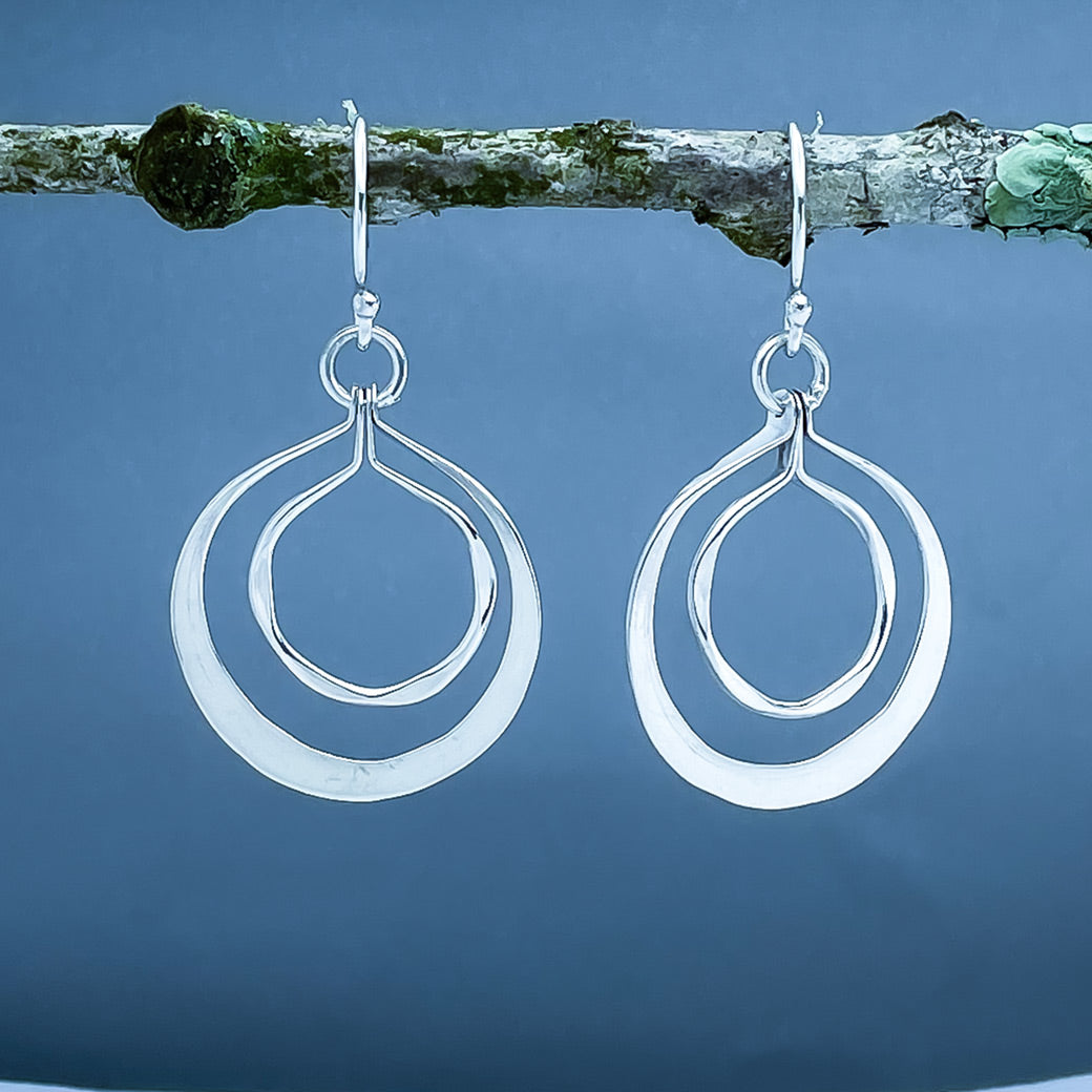 Tara Luminous Dangling Double Circle Silver Dangle Earrings