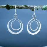 Tara Luminous Dangling Double Circle Silver Dangle Earrings