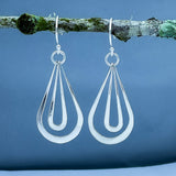 Tara Luminous Dangling Double Drop Silver Dangle Earrings