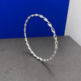 Tara Twisted Silver Bangle Bracelet