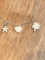 EIRE - Small Irish Heart + Shamrock + Star Silver Charm Set Pendant Curated and designed by Emilio Sotelo Jewelry for Croi Kinsale Jewellery in Kinsale West Cork Ireland Europe. Find exceptional handmade silver and gold jewellery at affordable prices for birthday gifts and Christmas presents. Find Irish designers and makers. Beautiful jewellery shop located in Kinsale, Co. Cork.