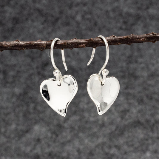 Croi - Small Heart Silver Earrings - Dangle Curated and designed by Emilio Sotelo Jewelry for Croi Kinsale Jewellery in Kinsale West Cork Ireland Europe. Find exceptional handmade silver and gold jewellery at affordable prices for birthday gifts and Christmas presents. Handcrafted Silver jewelry. Find the best affordable jewellery