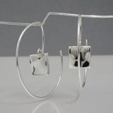 Selene - Small Square Reverse Hoop Silver Earrings Curated and designed by Emilio Sotelo Jewelry for Croi Kinsale Jewellery in Kinsale West Cork Ireland Europe. Find exceptional handmade silver and gold jewellery at affordable prices for birthday gifts and Christmas presents. Handcrafted Silver jewelry. The best affordable jewellery