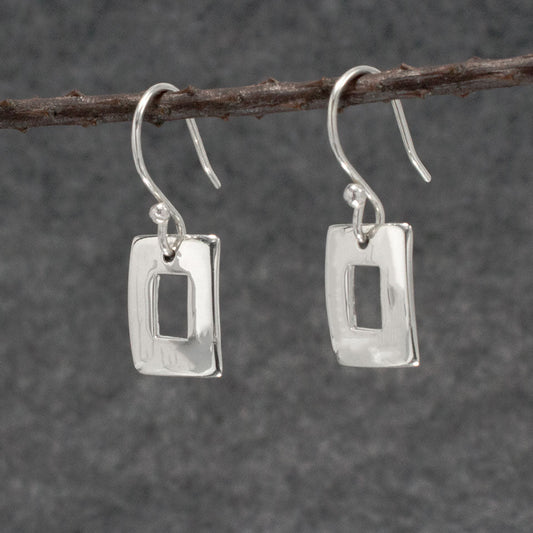Artemis - Small Off-Center Rectangle Silver Earrings - Dangle Curated and designed by Emilio Sotelo Jewelry for Croi Kinsale Jewellery in Kinsale West Cork Ireland Europe. Find exceptional handmade silver and gold jewellery at affordable prices for birthday gifts and Christmas presents. Handcrafted Silver jewelry. Find the best affordable jewellery