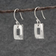 Artemis - Small Off-Center Rectangle Silver Earrings - Dangle Curated and designed by Emilio Sotelo Jewelry for Croi Kinsale Jewellery in Kinsale West Cork Ireland Europe. Find exceptional handmade silver and gold jewellery at affordable prices for birthday gifts and Christmas presents. Handcrafted Silver jewelry. Find the best affordable jewellery