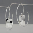 Artemis - Small Rectangle Hammered Reverse Hoop Silver Earrings Curated and designed by Emilio Sotelo Jewelry for Croi Kinsale Jewellery in Kinsale West Cork Ireland Europe. Find exceptional handmade silver and gold jewellery at affordable prices for birthday gifts and Christmas presents. Handcrafted Silver jewelry. The best affordable jewellery