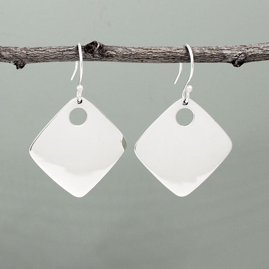 Nathalia - Rhombus Off-Center Dot Silver Earrings. With dimensions of 29mm long by 29mm wide, or roughly 1 1/4 inches square, they make a bold yet elegant statement. The off-center dot design adds a unique flair to their high polished finish.