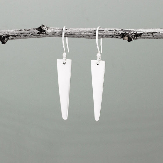 Gleaming with a luxurious high-polished finish, these Nathalia earrings dangle 28mm long and 7mm wide (1 1/8"x 1/4") - 1 5/8" from the top of the earwire. Crafted from .950 sterling silver, they are the perfect statement jewelry accessory!