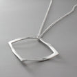 AYA - Outer Square Silver Pendant Curated and designed by Emilio Sotelo Jewelry for Croi Kinsale Jewellery in Kinsale West Cork Ireland Europe. Find exceptional handmade silver and gold jewellery at affordable prices for birthday gifts and Christmas presents. Find Irish designers and makers. Beautiful jewellery shop located in Kinsale, Co. Cork.