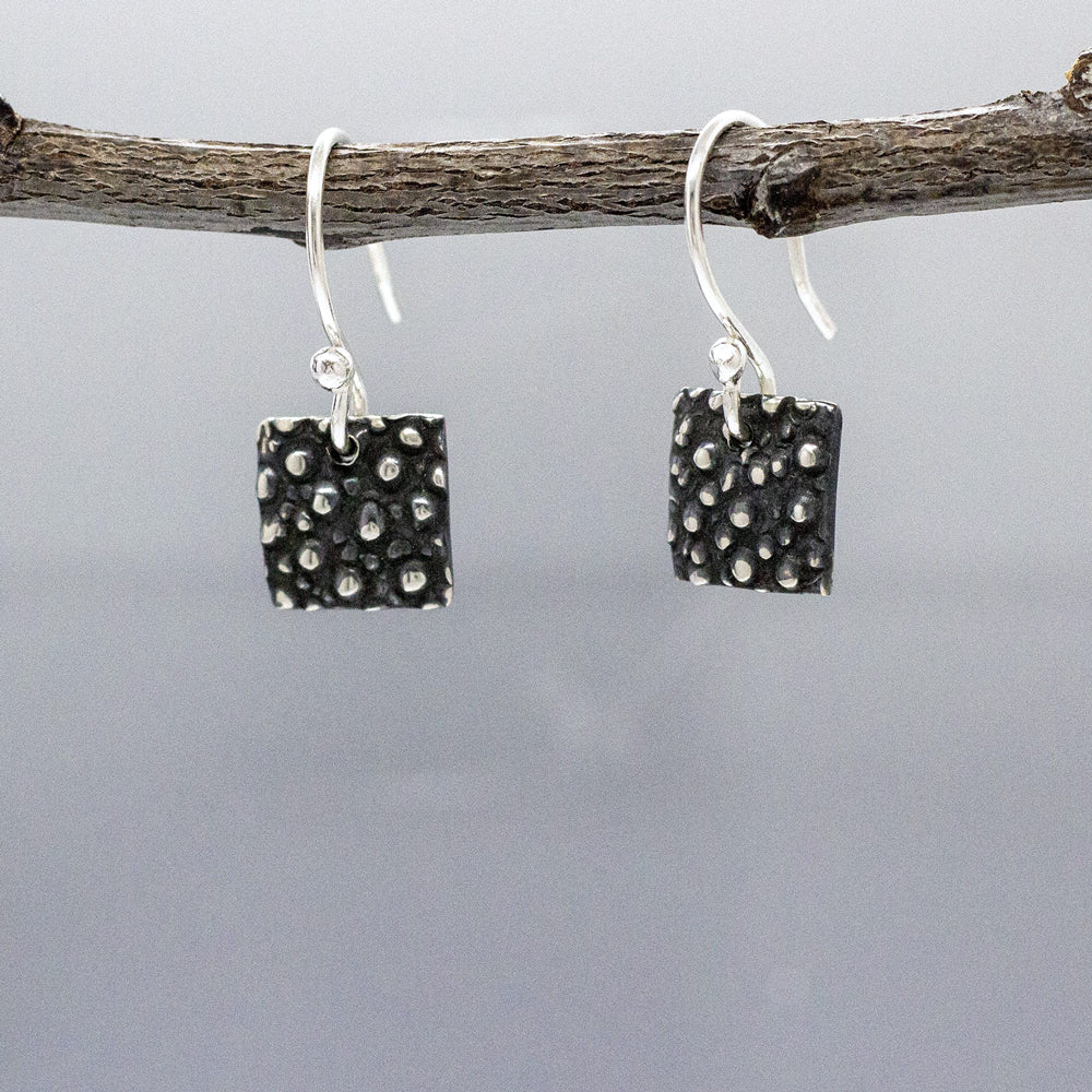 Firmament - Small Square Oxidised Silver Earrings - Dangle Curated and designed by Emilio Sotelo Jewelry for Croi Kinsale Jewellery in Kinsale West Cork Ireland Europe. Find exceptional handmade silver and gold jewellery at affordable prices for birthday gifts and Christmas presents. Handcrafted Silver jewelry. Find the best affordable jewellery