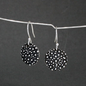 Firmament - Disc Oxidised Silver Earrings - Dangle Curated and designed by Emilio Sotelo Jewelry for Croi Kinsale Jewellery in Kinsale West Cork Ireland Europe. Find exceptional handmade silver and gold jewellery at affordable prices for birthday gifts and Christmas presents. Handcrafted Silver jewelry. Find the best affordable jewellery