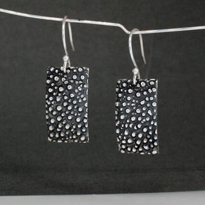 Firmament - Rectangle Oxidised Silver Earrings - Dangle Curated and designed by Emilio Sotelo Jewelry for Croi Kinsale Jewellery in Kinsale West Cork Ireland Europe. Find exceptional handmade silver and gold jewellery at affordable prices for birthday gifts and Christmas presents. Handcrafted Silver jewelry. Find the best affordable jewellery