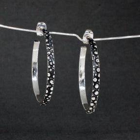 Firmament - Hoop Oxidised Silver Earrings - Stud Curated and designed by Emilio Sotelo Jewelry for Croi Kinsale Jewellery in Kinsale West Cork Ireland Europe. Find exceptional handmade silver and gold jewellery at affordable prices for birthday gifts and Christmas presents. Handcrafted Silver jewelry. Find the best affordable jewellery