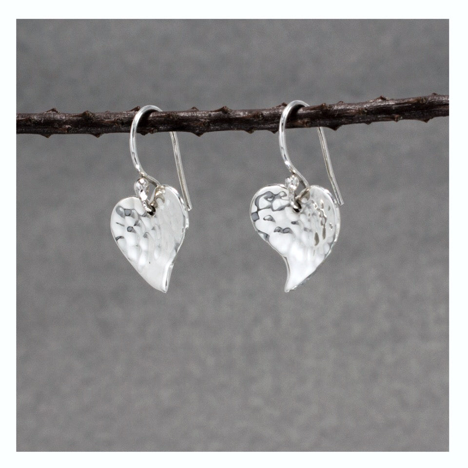 Croi - Small Heart Hammered Silver Earrings - Dangle Curated and designed by Emilio Sotelo Jewelry for Croi Kinsale Jewellery in Kinsale West Cork Ireland Europe. Find exceptional handmade silver and gold jewellery at affordable prices for birthday gifts and Christmas presents. Handcrafted Silver jewelry. Find the best affordable jewellery