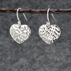 Croí Miller Heart Hammered Silver Dangle Earrings,Ê Shop affordable, high-quality jewellery in Kinsale, West Cork, Ireland designed by Emilio Sotelo Jewelry