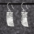 Artemis - Rectangle Hammered Silver Earrings - Dangle Curated and designed by Emilio Sotelo Jewelry for Croi Kinsale Jewellery in Kinsale West Cork Ireland Europe. Find exceptional handmade silver and gold jewellery at affordable prices for birthday gifts and Christmas presents. Handcrafted Silver jewelry. Find the best affordable jewellery