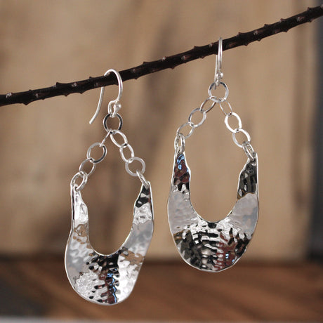 Saha - Lola Hammered Silver Earrings - Dangle Curated and designed by Emilio Sotelo Jewelry for Croi Kinsale Jewellery in Kinsale West Cork Ireland Europe. Find exceptional handmade silver and gold jewellery at affordable prices for birthday gifts and Christmas presents. Handcrafted Silver jewelry. Find the best affordable jewellery