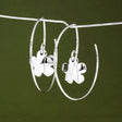 Moineir - Small Clover Reverse Hoop Silver Earrings Curated and designed by Emilio Sotelo Jewelry for Croi Kinsale Jewellery in Kinsale West Cork Ireland Europe. Find exceptional handmade silver and gold jewellery at affordable prices for birthday gifts and Christmas presents. Handcrafted Silver jewelry. The best affordable jewellery