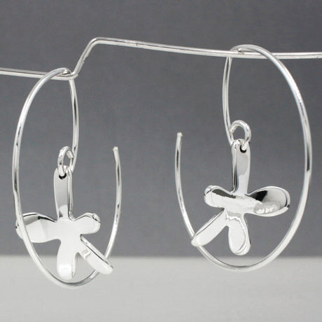 Moineir - Small Happy Daisy Reverse Hoop Silver Earrings Curated and designed by Emilio Sotelo Jewelry for Croi Kinsale Jewellery in Kinsale West Cork Ireland Europe. Find exceptional handmade silver and gold jewellery at affordable prices for birthday gifts and Christmas presents. Handcrafted Silver jewelry. The best affordable jewellery